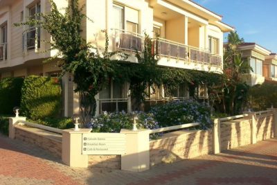 Отель Kamer Suites & Hotel