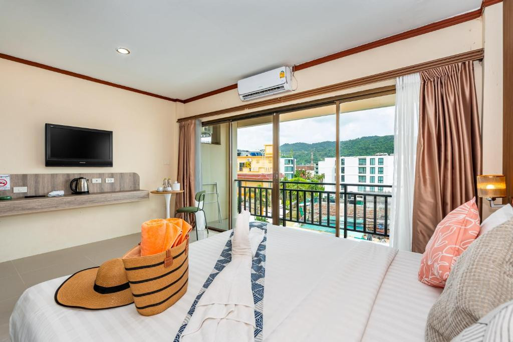 Фото отеля THE OUTDOOR KATA (EX. OUTDOOR INN)