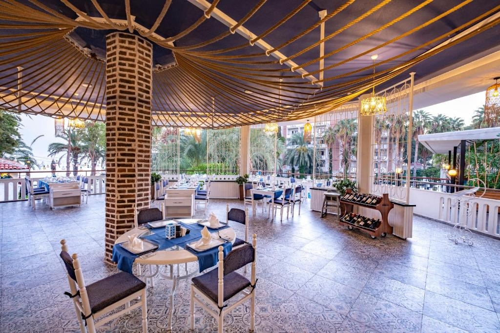 Фото отеля UTOPIA RESORT & RESIDENCE (EX. ALARA PARK HOTEL)