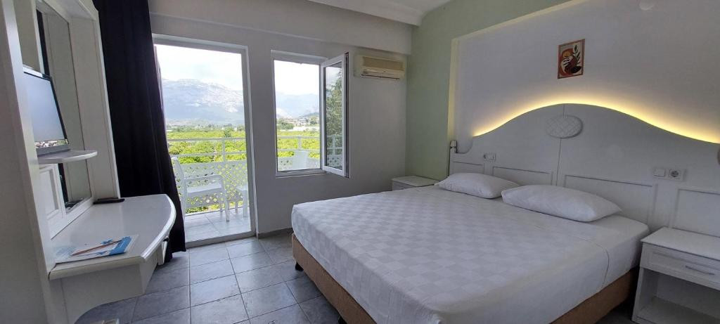 Фото отеля UK HOTEL KIRIS (EX. KIRIS ROSE, SAILORS PARK)