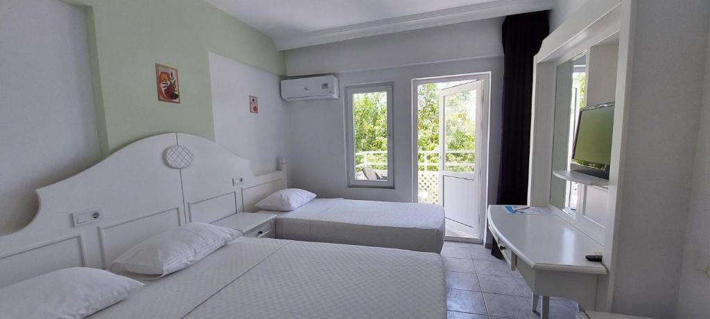 Фото отеля UK HOTEL KIRIS (EX. KIRIS ROSE, SAILORS PARK)