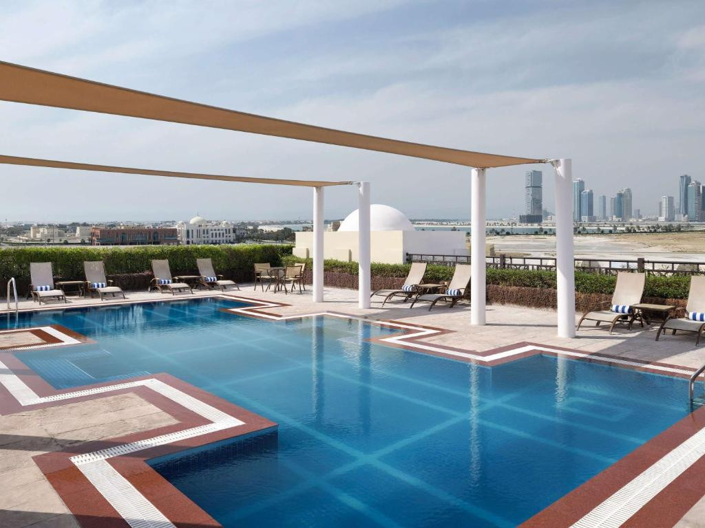 MOVENPICK HOTEL APARTMENTS AL MAMZAR - фото 1